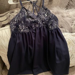 Item is blue lace w/ silver embroidery. Never worn, no tag available. 22/24